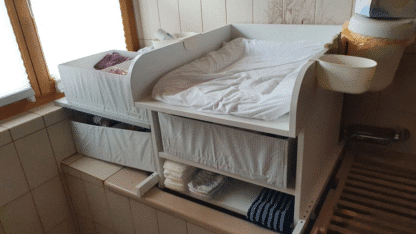 Changing table with shelf on bathtub